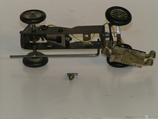BOTTOM VIEW OF THE HANDMADE CHASSIS & MOTOR FOR THE ERA.