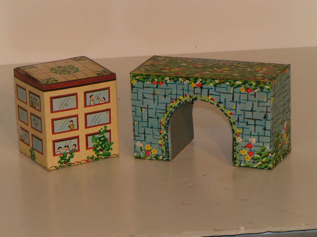 2 OF THE 5 CARDBOARD BUILDINGS FOR THE SINGLE LANE SET.
