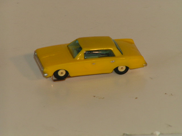 HO SCALE 1963 PLYMOUTH VALIANT/THE SAME AS THE SANWA HO CAR EXCEPT THE CHASSIS  & MOTOR. FROM THE HO SET. RARE