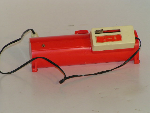 BATTERY CONTROLLER WITH A METAL SWITCH FOM THE 1ST TOMY SLOT CAR SET. RARE