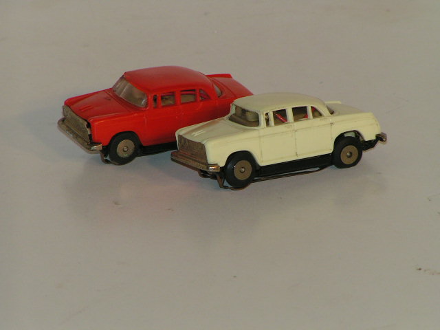 BOTH HO SCALE NISSAN CEDRIC SEDANS TOGETHER.FROM THE 1ST TOMY SLOT CAR SET. RARE