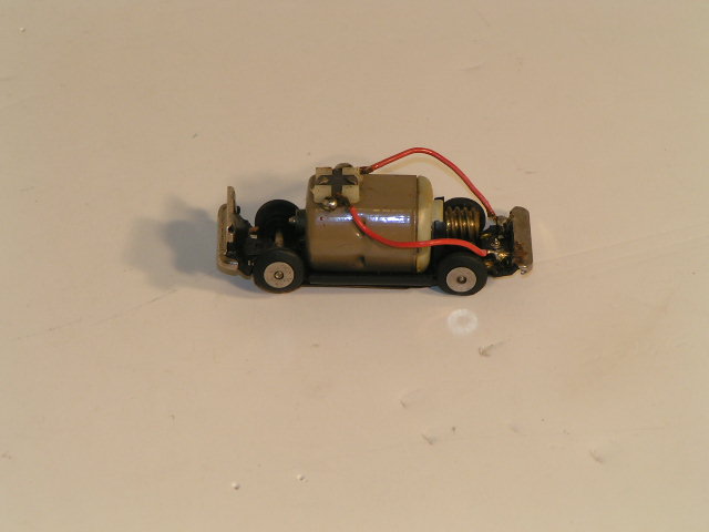 HO SCALE CHASSIS FOR THE NISSAN CEDRIC. BRASS WORM GEAR. RARE