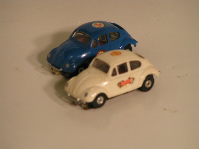 2 HO SCALE VW BEETLES FROM THE AUTO RALLY SET.