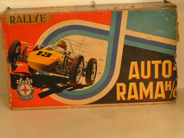 HO SCALE SET AUTO RALLY BOX TOP, 1960S. IT SLIDES AROUND THE SET NOT LIKE MOST WHICH FIT ON TOP. RARE