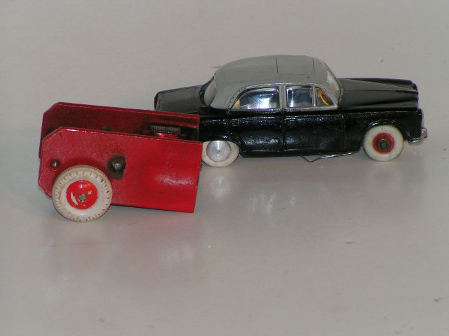 THE MOTOR SHOWING ITS SIZE COMPARED TO A EARLY 1/43RD SCALE JOMA CAR