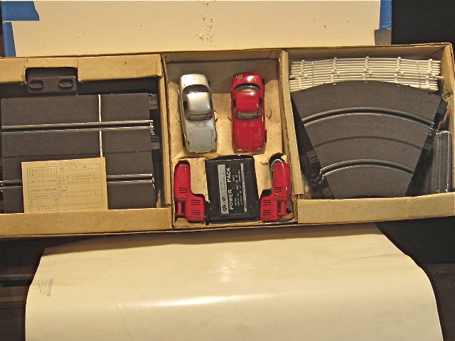CONTENT OF THE 1/24TH SCALE SET WITH 2 TOYOTA 800S MADE BY KOGURE. RARE