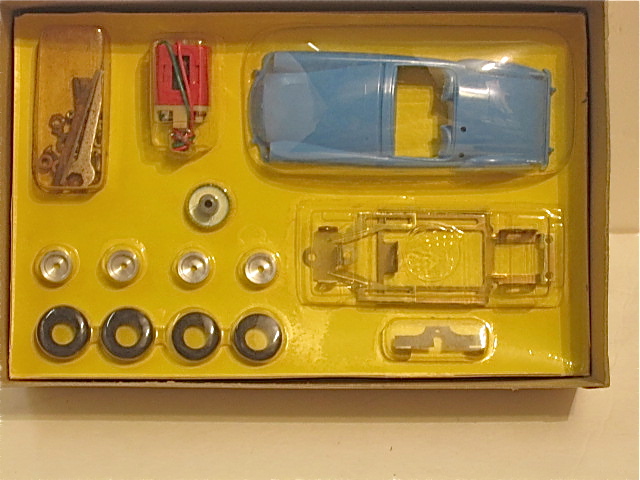 CONTENTS OF THE1/32ND SCALE MGA.  MIB