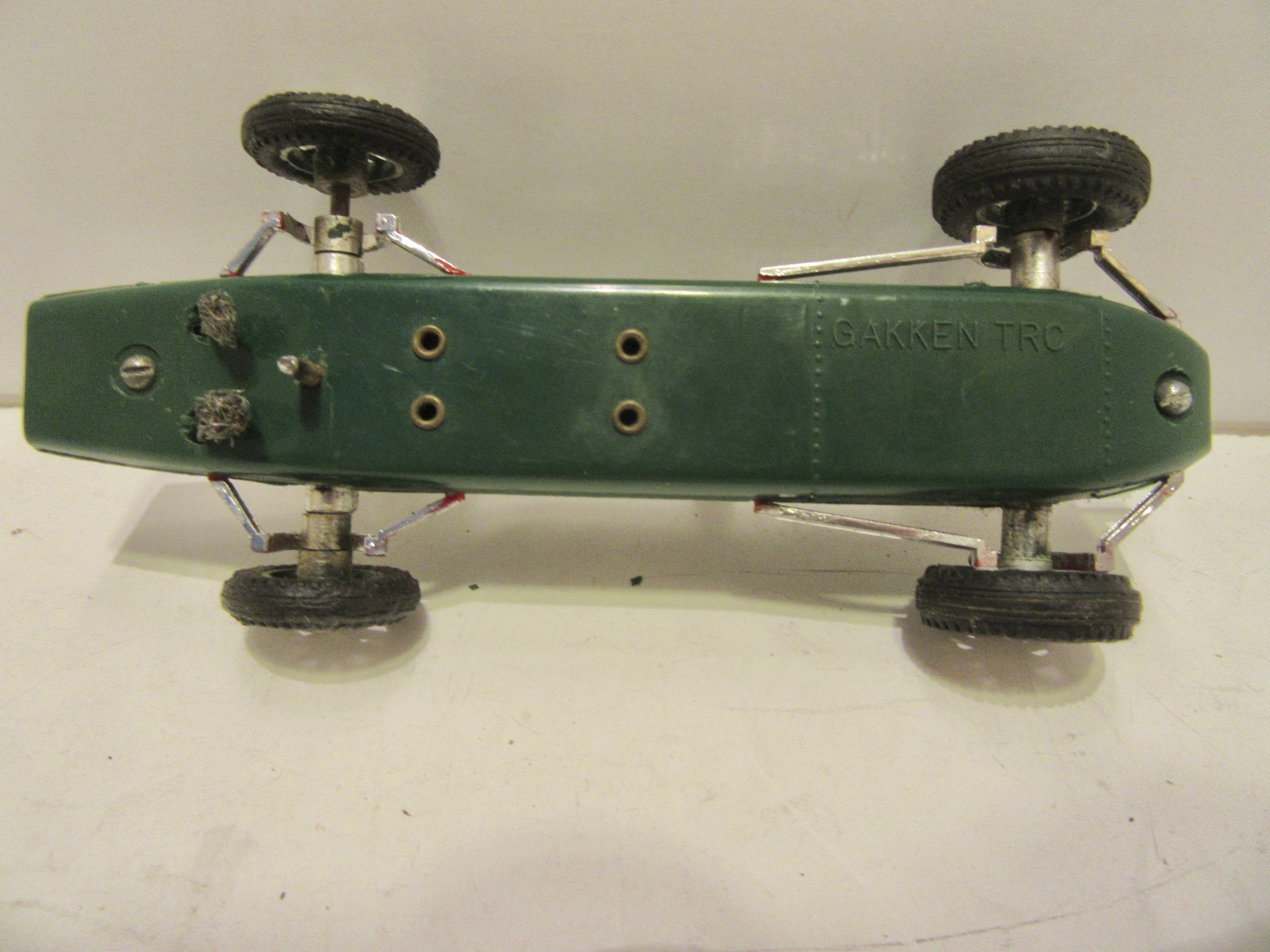 UNDERSIDE OF THE 1/43RD SCALE LOTUS 25. 