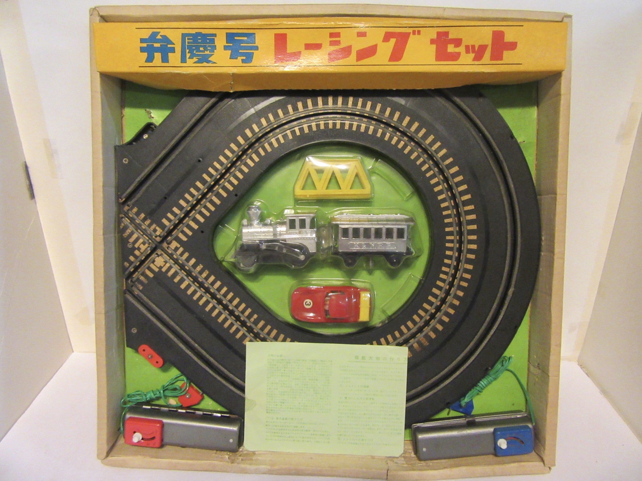 CONTENTS OF THE 1/43RD SCALE PORSCHE GT 904 & TRAIN SET. VERY RARE 
