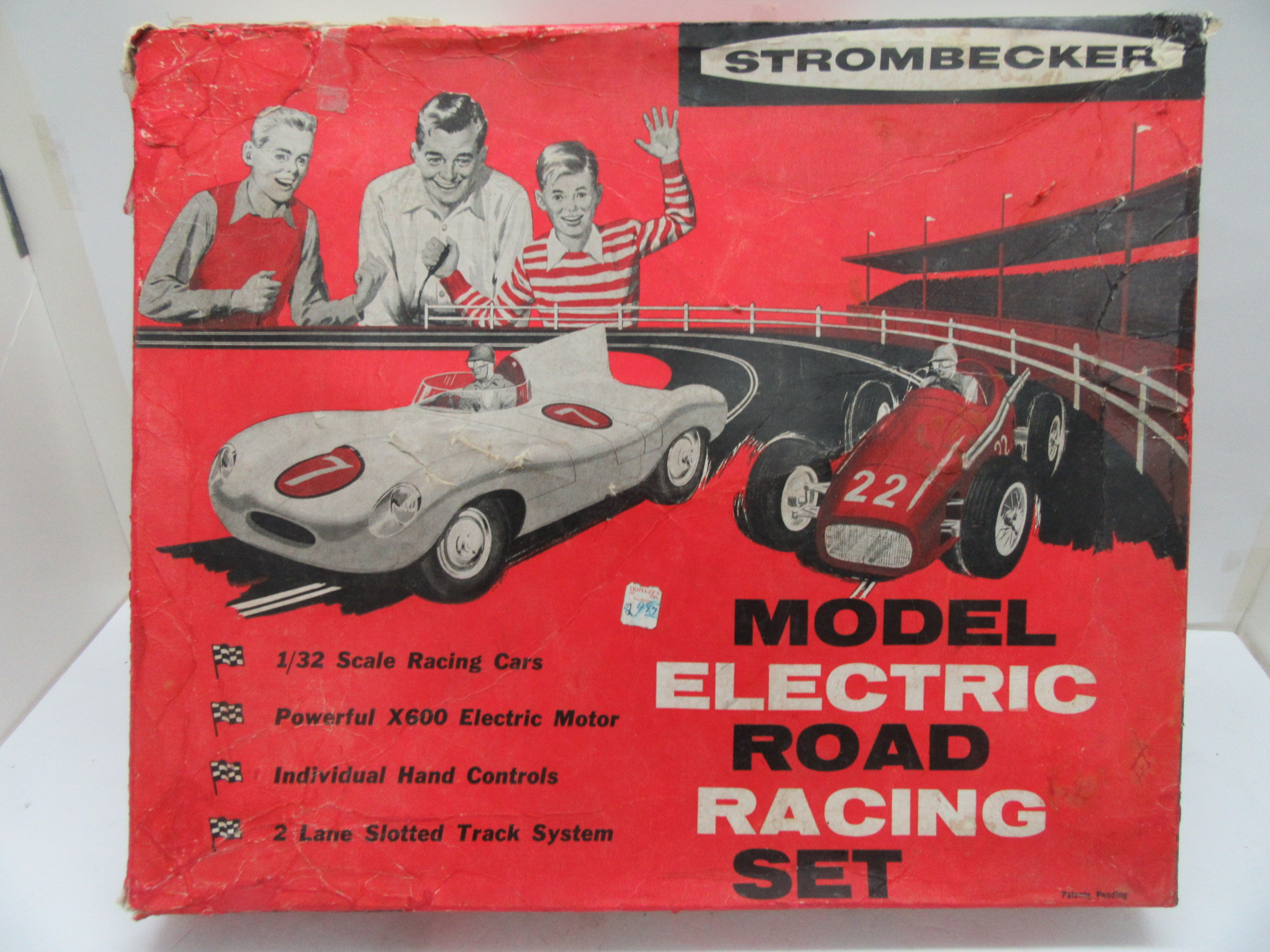 EXTREMELY RARE 159-60 TRANSITIONAL 312 SET WITH A 1/32ND SCALE MASERATI 250 & A JAGUAR D. BOTH HAVE THE WHITE NYLON CHASSIS & WHEELS. THE RED LONG SHAFT 6 VOLT MOTOR & THE OPEN COCKPIT. 