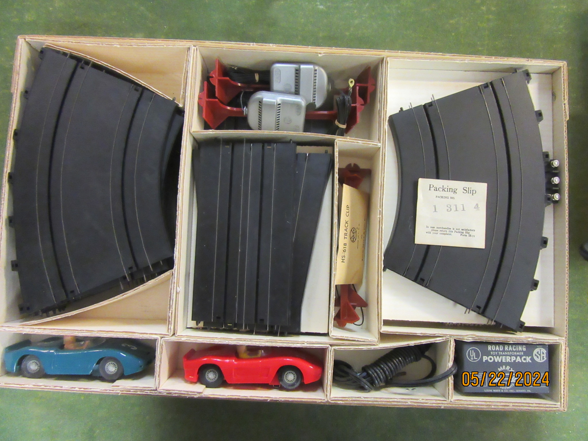 CONTENTS OF THE 1/3OTH SCALE MONTE CARLO SET WITH 2 FERRARI CARS, MIB.