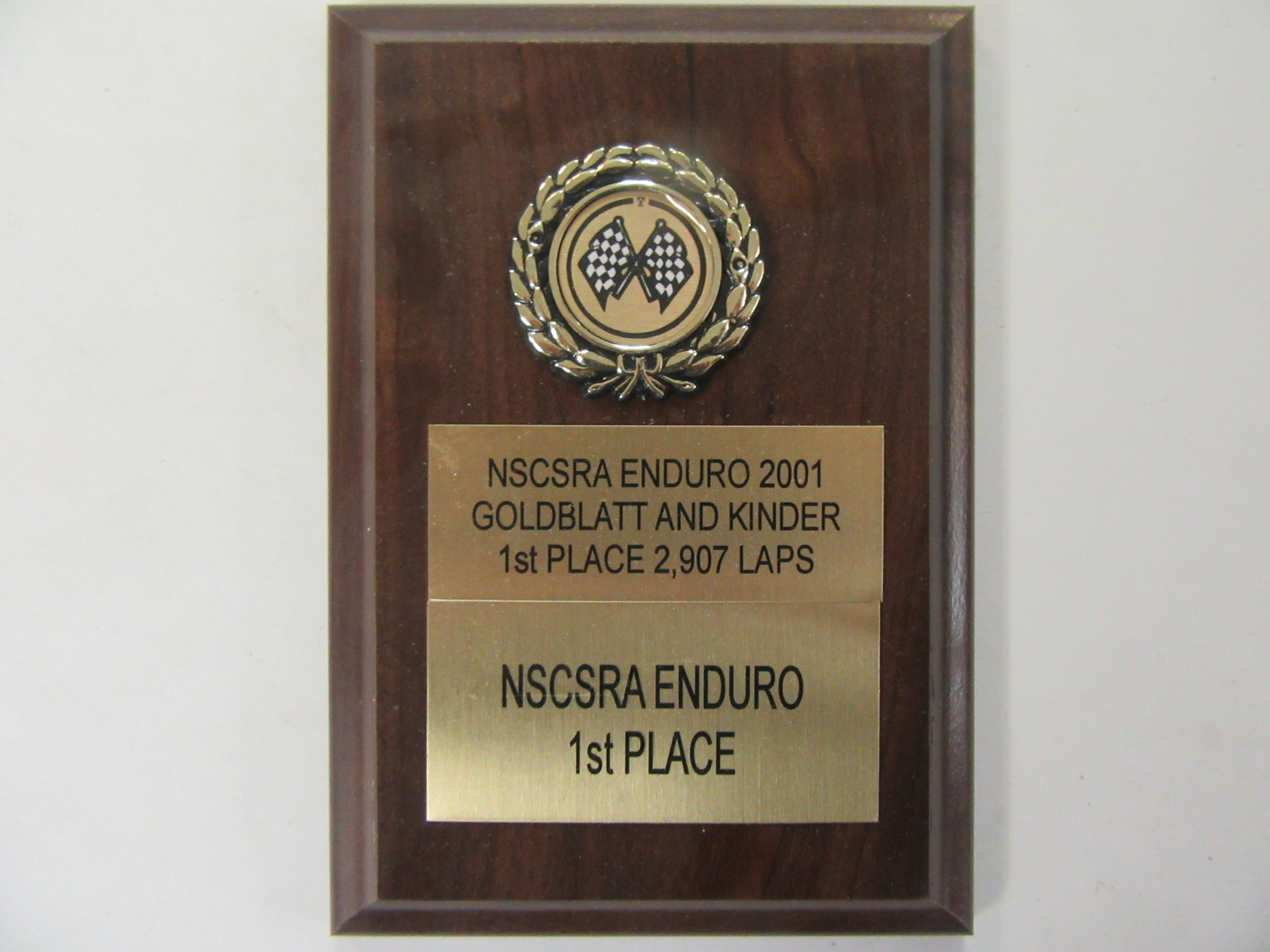 NSCSRA 1ST PLACE TROPHY WON BY KC KENNEDY IN A ENRURO RACE IN WHICH HE DID 2,907 LAPS