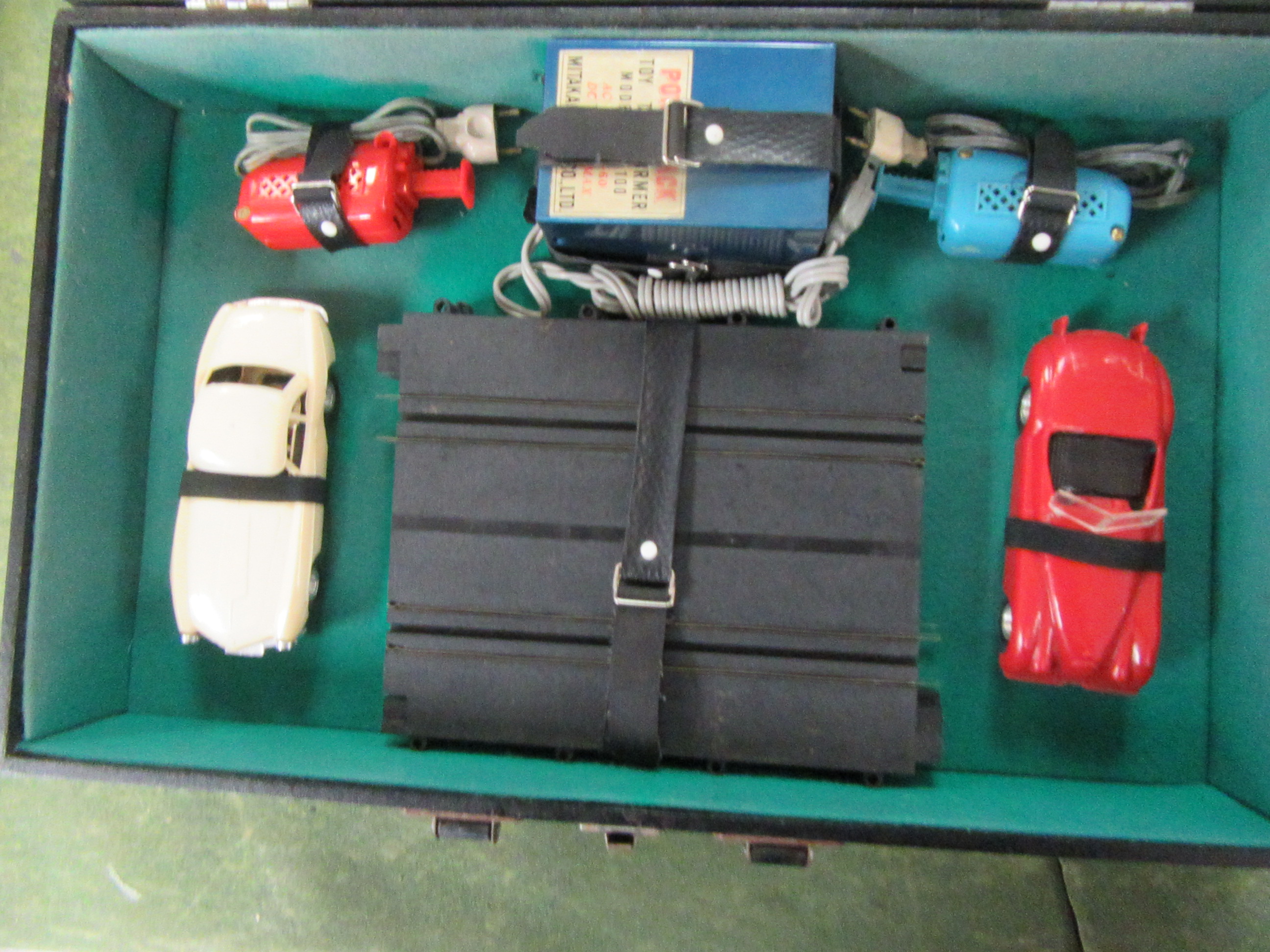 CLOSEUP OF SECOND SET WITH A RED JAGUAR XK120 & A BMW 507