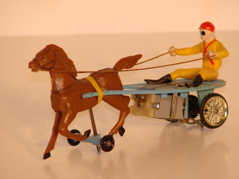  SULKY. THE HORSES LEGS MOVE.