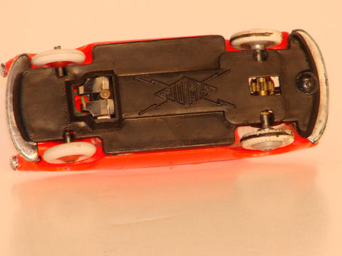 UNDERSIDE OF THE 1/43RD SCALE ALFA ROMERO. CHASSIS IS UNREMOVABLE.