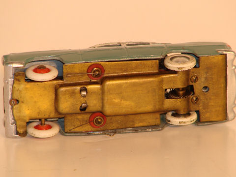 UNDERSIDE OF SIMCA ARIANE 1957,1ST TYPE WIRE CONTACTS. WORM GEAR, DIECAST BODY BY QUIRALU. RARE