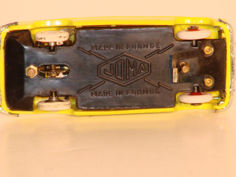 UNDERSIDE OF THE 1/43RD SCALE SIMCA. CHASSIS IS REMOVABLE,WORM GEAR 