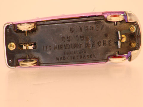 UNDERSIDE OF 1/43RD SCALE CITROEN DS 19.CHASSIS IS REMOVABLE.