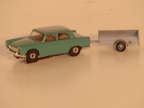 HO SCALE PEUGEOT 404 WITH TRAILER.